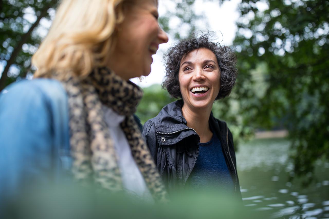 Two women hiking in a forest