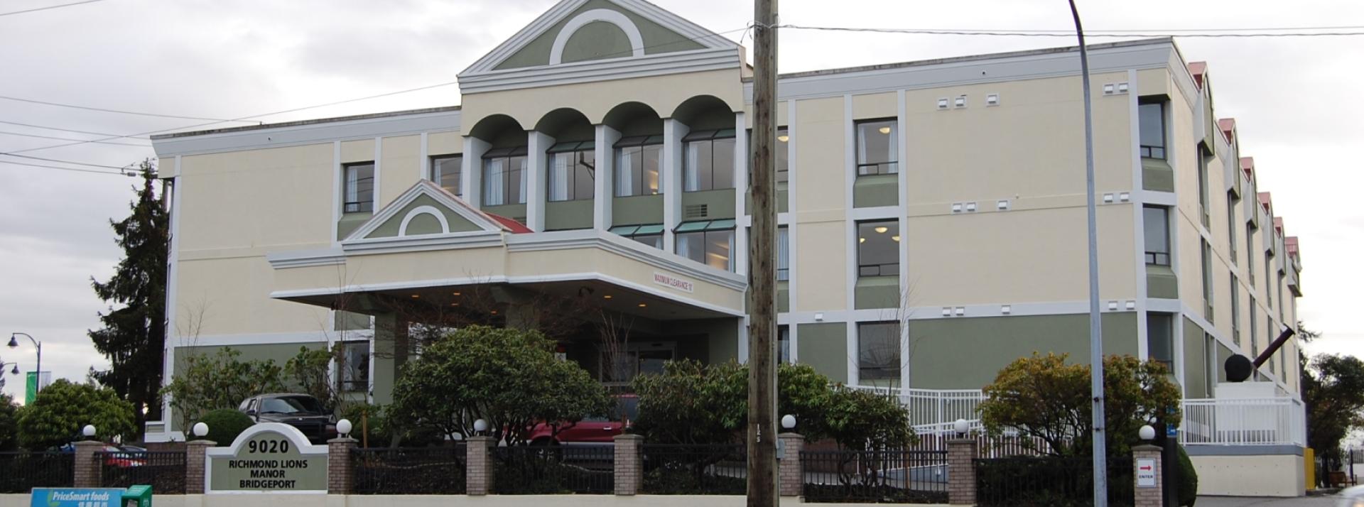 Exterior of Richmond Lions Manor Bridgeport on an overcast day.