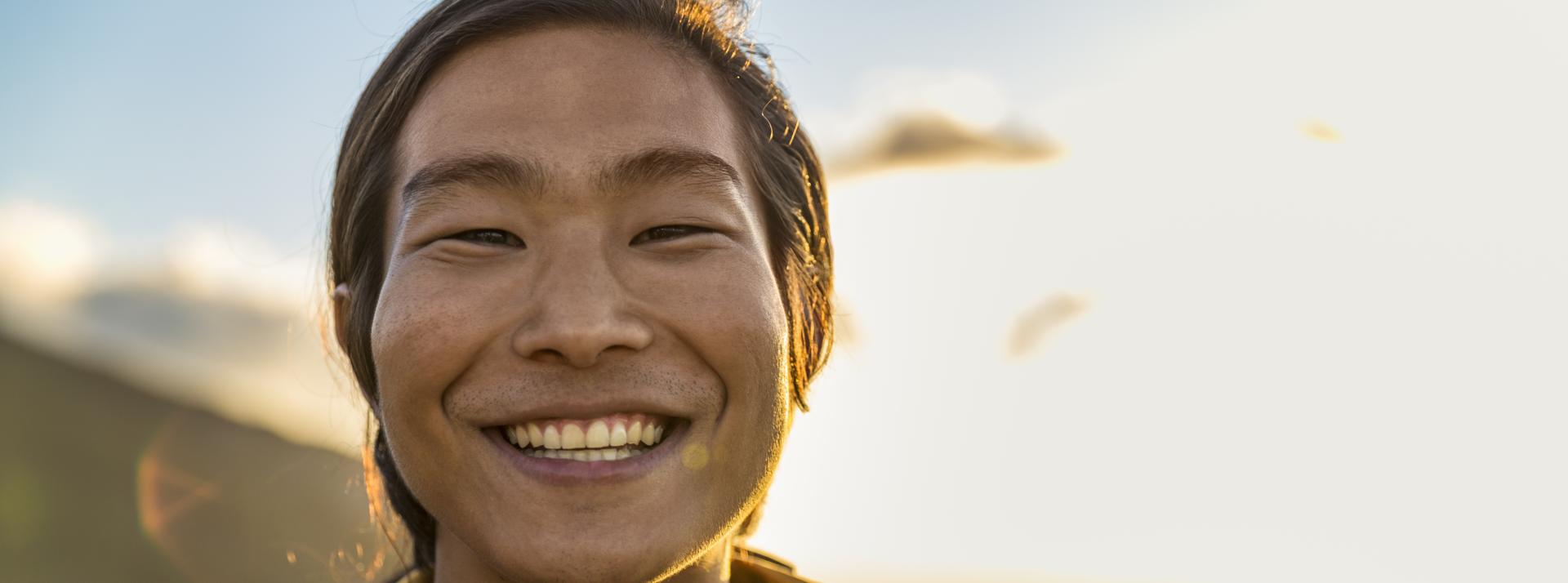 Backpacker smiling at camera