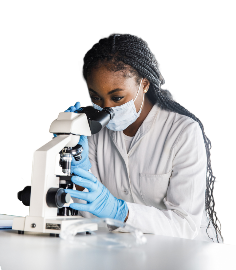 A scientist using a microscope for research