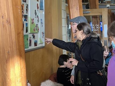 Participants and visitors admiring the beauty of the “Better Together" art display.