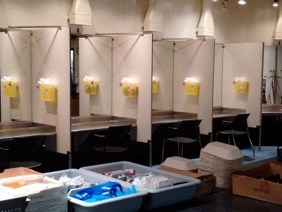 Private injection booths at insite with harm reduction supplies in the foreground
